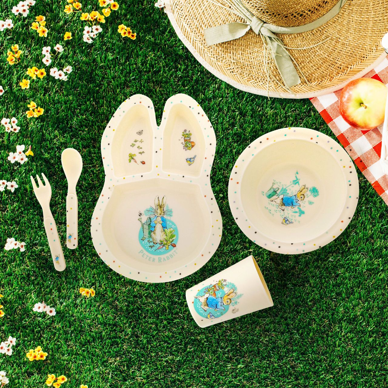 Peter Rabbit Dinner Set Beatrix Potter  Introducing this brand new at home with Peter Rabbit collection. There's nothing quite like a fun Peter Rabbit motif to entice those little tummies to clear their plates. Make mealtimes fun and practical with this dinner set. This highly durable dinner set can be used at home, in the garden, or on the go.