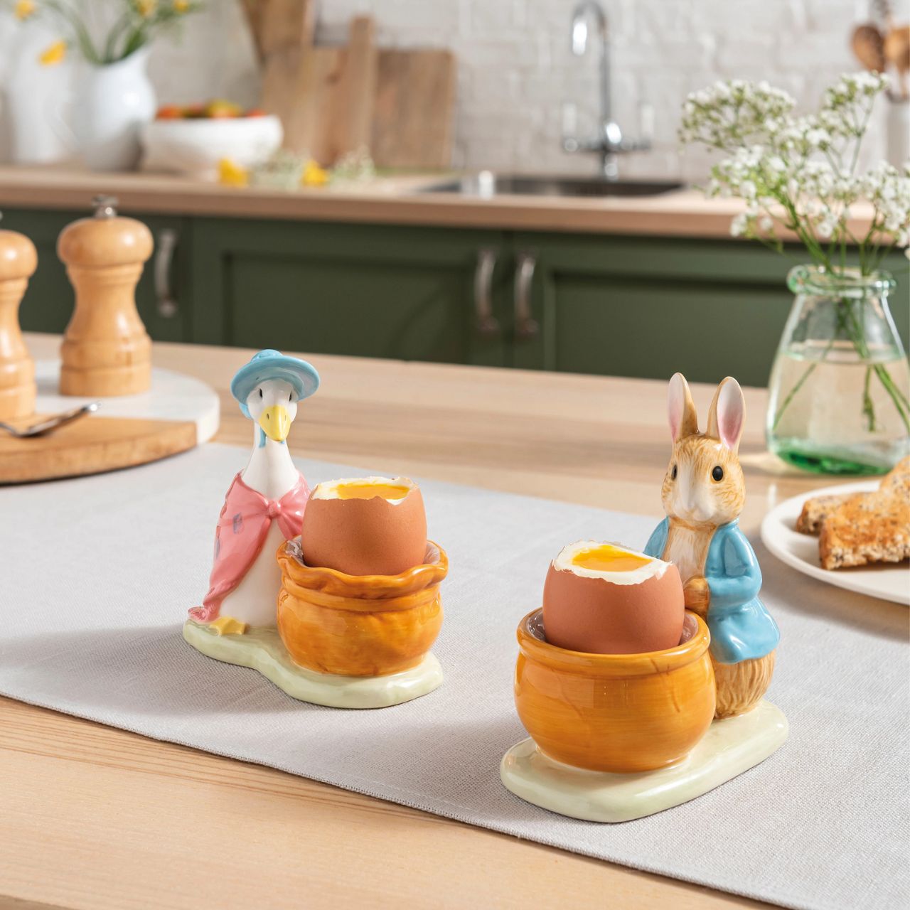 Peter Rabbit Egg Cup  Serve your morning eggs in style with our unique and charming Peter Rabbit egg cup, because regular egg cups aren't all they're cracked up to be...This beautiful Beatrix Potter egg cup has been made from sturdy ceramic and makes the ideal collector's piece or gift. We recommend you use large eggs to feel the true benefit, or why not fill with mini chocolate eggs for a sweet easter gift.