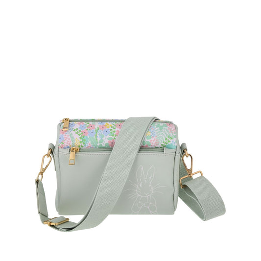 Discover elegance with our faux leather Beatrix Potter Crossbody bag. Featuring adjustable and removable straps, Gold colour metalwork plus internal pockets for easy organization. Comes with a branded dust bag-perfect for those who love timeless charm and functionality.
