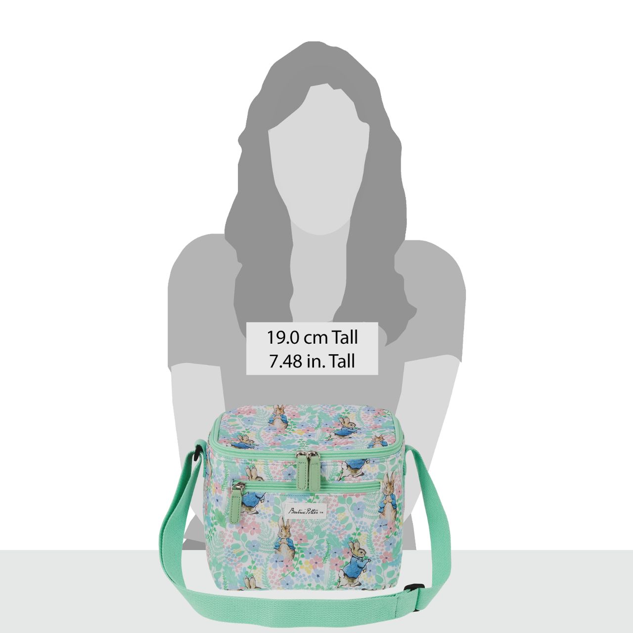 Elevate your lunch routine with the charming Peter Rabbit English Garden Lunch Bag. This insulated bag keeps meals fresh and features a fun and stylish Peter Rabbit design. The adjustable shoulder strap ensures comfortable carrying, while the external pocket provides convenient storage.