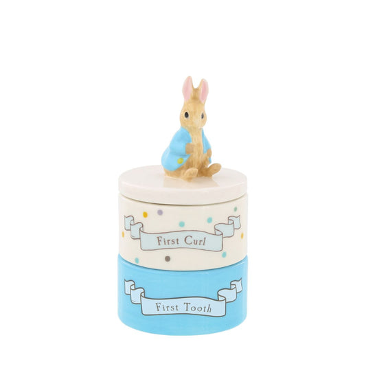 Enhance your store's charm with the Beatrix Potter Stackable Tooth and Curl Set. Featuring our beloved Peter Rabbit, this high-quality keepsake is perfect for nursery and gift sections. It Makes a perfect and unique christening gift.