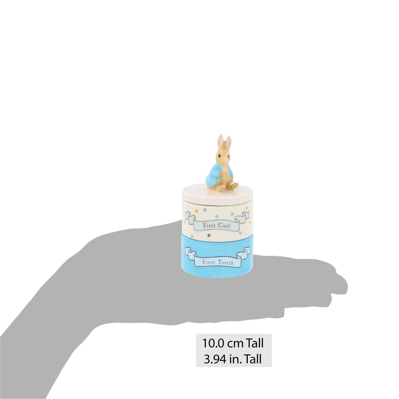 Enhance your store's charm with the Beatrix Potter Stackable Tooth and Curl Set. Featuring our beloved Peter Rabbit, this high-quality keepsake is perfect for nursery and gift sections. It Makes a perfect and unique christening gift.