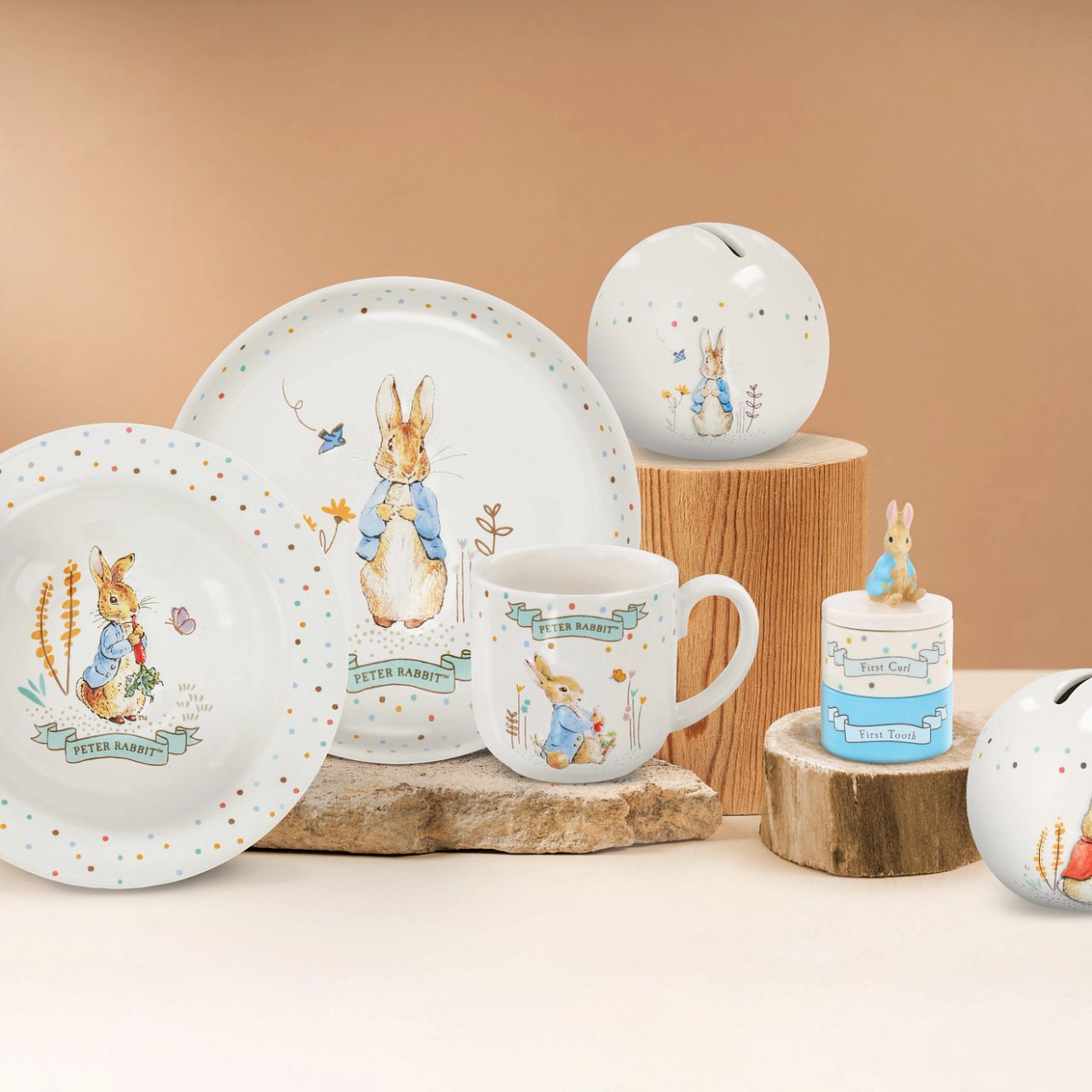 Enhance your store's charm with the Beatrix Potter Stackable Tooth and Curl Set. Featuring our beloved Peter Rabbit, this high-quality keepsake is perfect for nursery and gift sections. It Makes a perfect and unique christening gift.