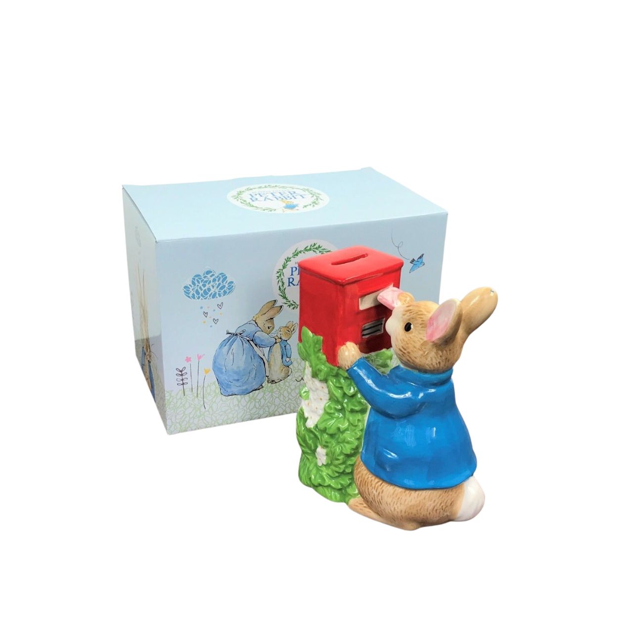 Beatrix Potter Peter Rabbit Posting a Letter Money Bank  A beautiful ceramic Peter Rabbit money bank, perfect for storing your pennies. The artwork is taken from the original illustrations from the Beatrix Potter stories. This Peter Rabbit money bank is sure to make a wonderful gift and comes presented in a branded gift box.