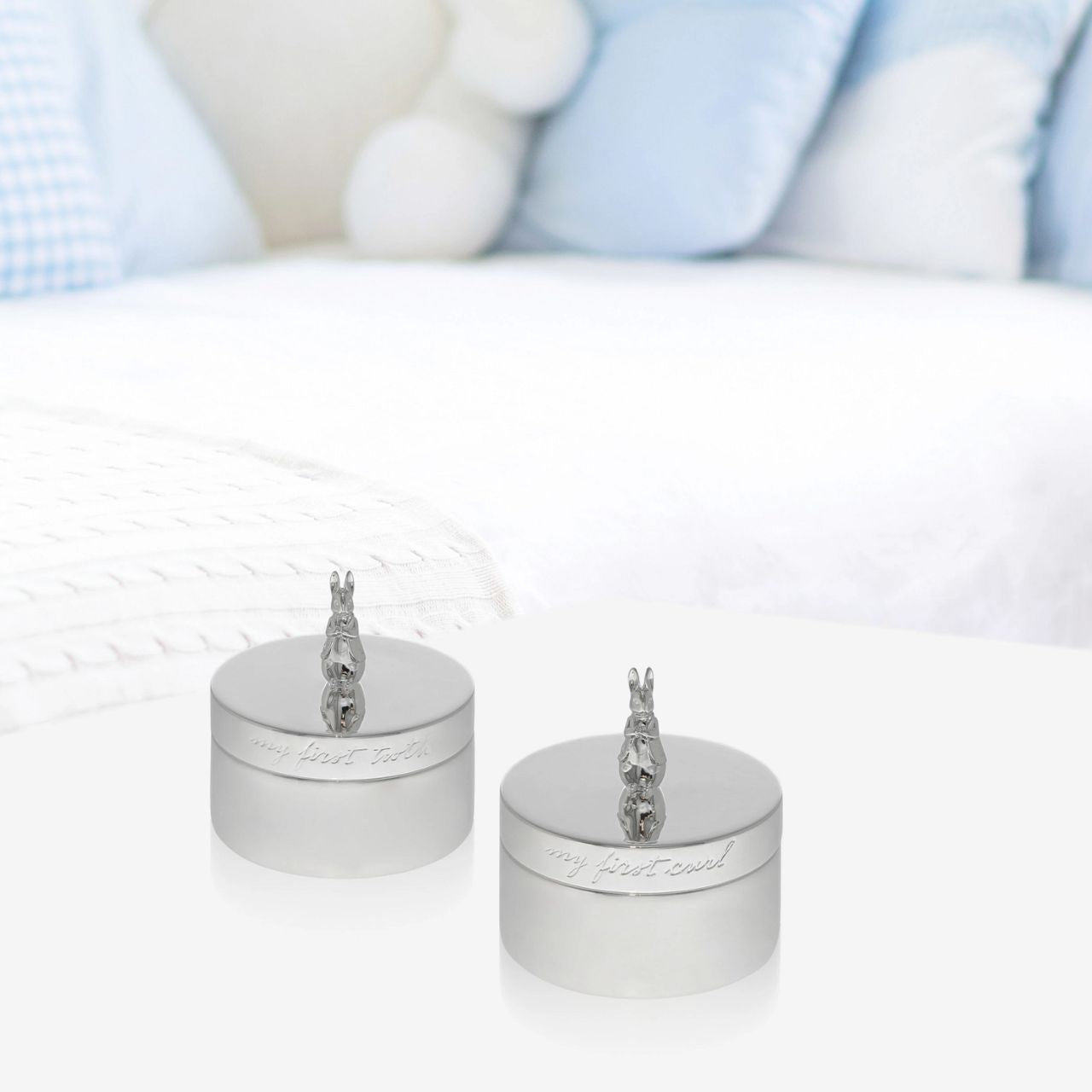 Celebrate a new bundle of joy with the Beatrix Potter New Baby collection. The silver-plated First Tooth and Curl boxes make a fantastic gift to store treasured keepsakes of a new arrival. With a sculpted Peter Rabbit on each lid and etched text around each box, they will become a treasured possession for new parents.