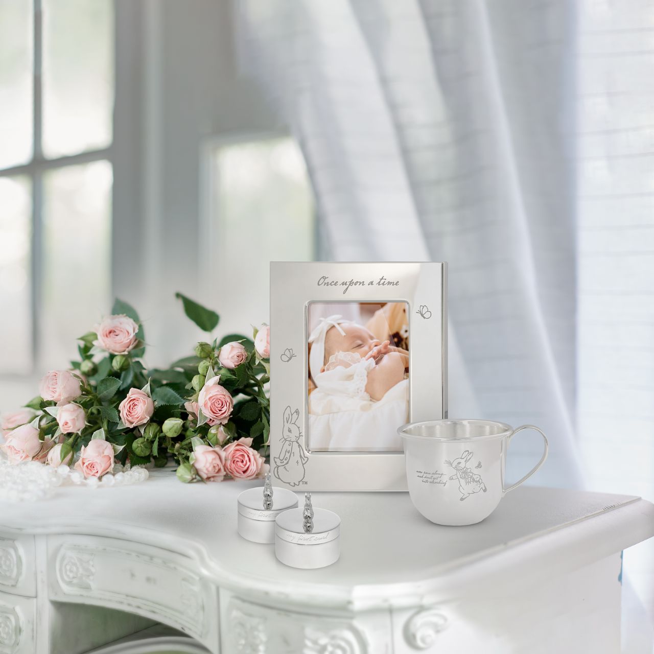 Celebrate a new bundle of joy with the Beatrix Potter New Baby collection. The silver-plated First Tooth and Curl boxes make a fantastic gift to store treasured keepsakes of a new arrival. With a sculpted Peter Rabbit on each lid and etched text around each box, they will become a treasured possession for new parents.