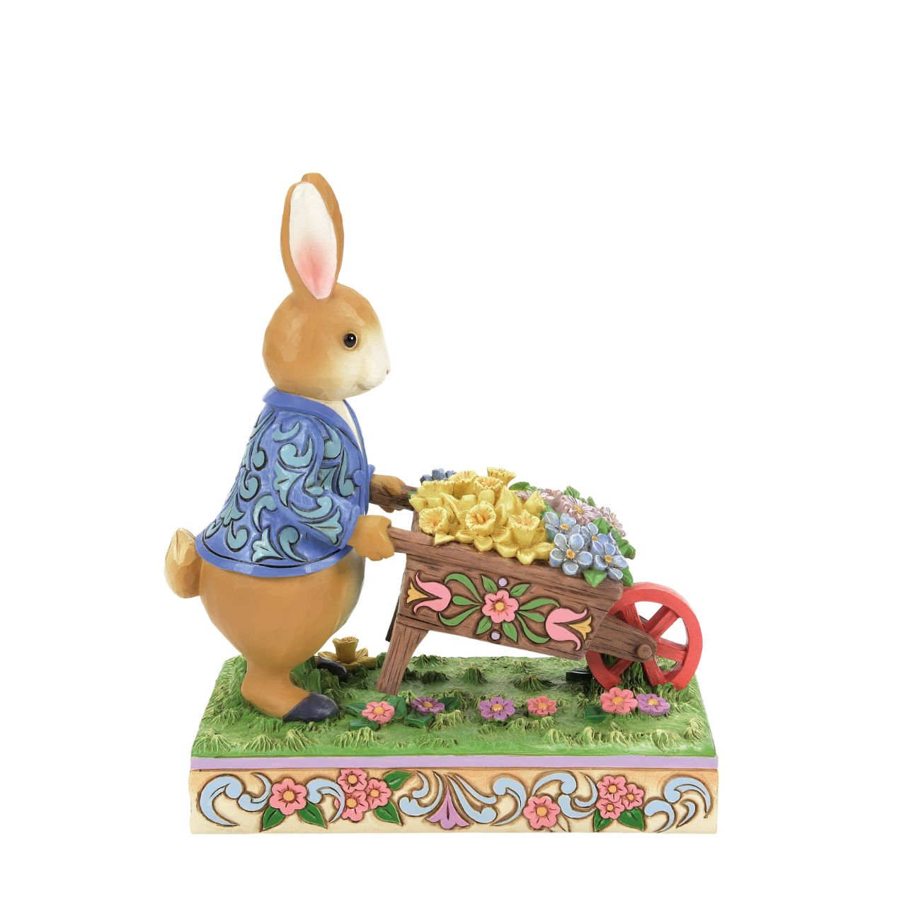Peter Rabbit with Wheelbarrow of Flowers - Wearing his signature blue coat, Peter Rabbit pushes a wheelbarrow full of inviting flowers in this beautiful creation. Designed by Jim Shore, this creation features a wealth of inspired rosemale details, enchanting craftsmanship, and cheerful colour.