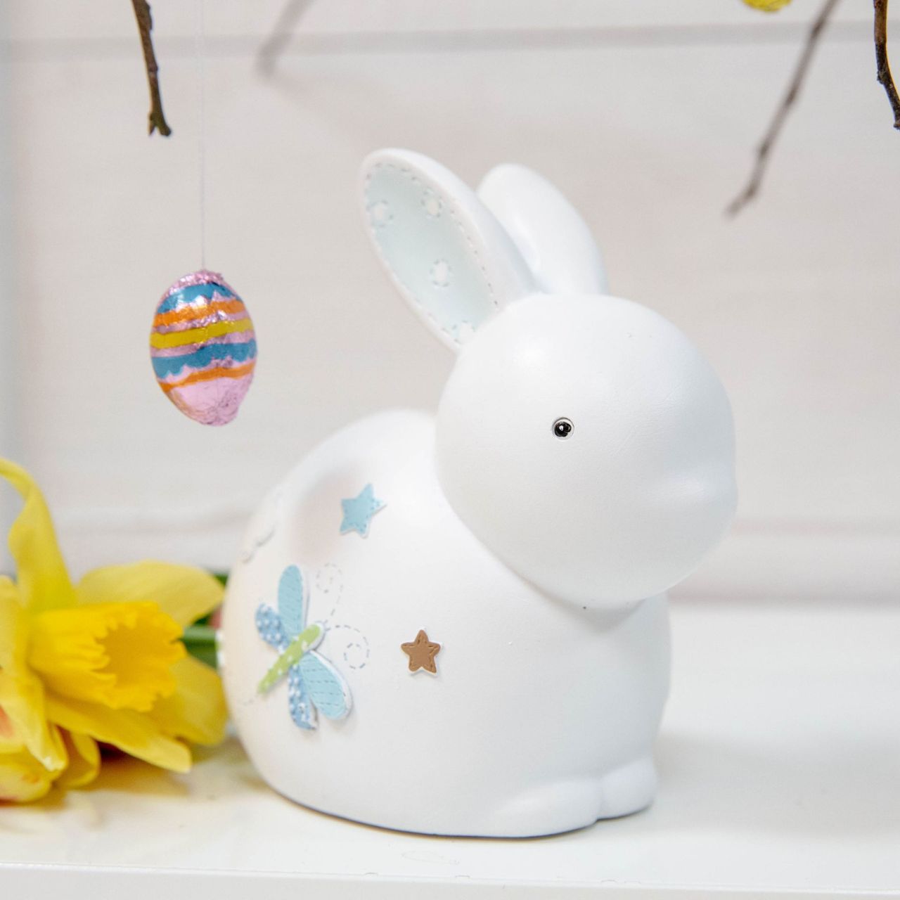'Petit Cheri' Collection Money Box Blue Rabbit  Help a precious new arrival save for their very first rainy day with this adorable blue and white bunny rabbit money box. From the Petit Cheri Collection by CELEBRATIONS - vintage, rustic and utterly charming gifts for your little darling.