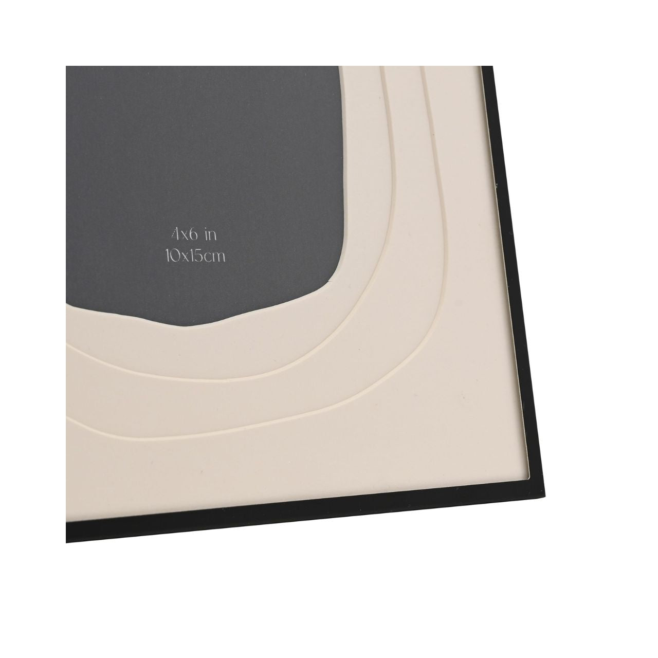 The Hestia Black Aluminium Photo Frame with Layered Mount is a striking piece for displaying memories. Its sleek black aluminium frame contrasts with the crisp white matte, highlighting the cherished 4x6 inch photograph at its centre.