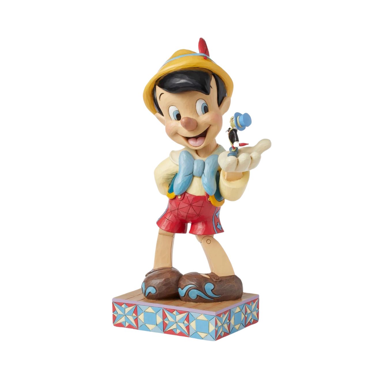 Disney's Pinocchio is the size of a real boy with this figurine. Hand carved and painted, this piece comes from the Disney Traditions collection by Jim Shore. This impressive piece comes packaged in a fully branded gift box.