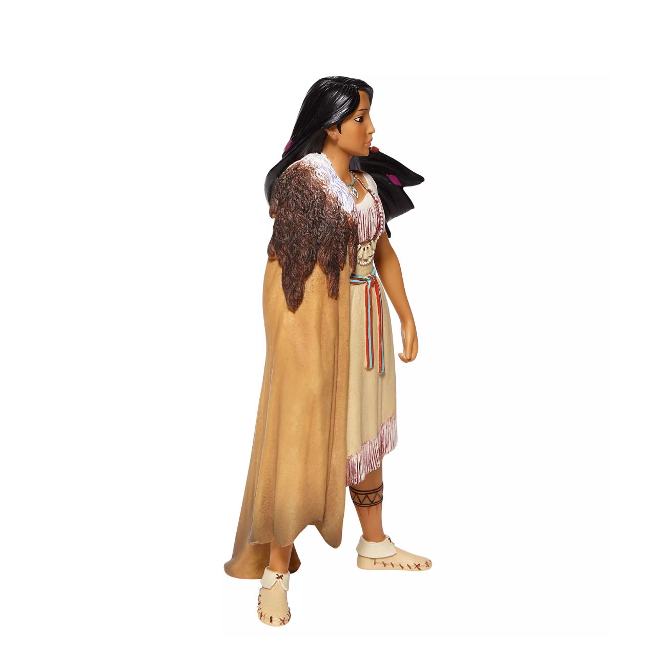 Pocahontas, daughter of Chief Powhatan of the Virginian native American tribe, strikes a powerful pose in this captivating Disney statuette. With colours in her hair and moccasins on her feet, she is a vision of beauty and female capability.
