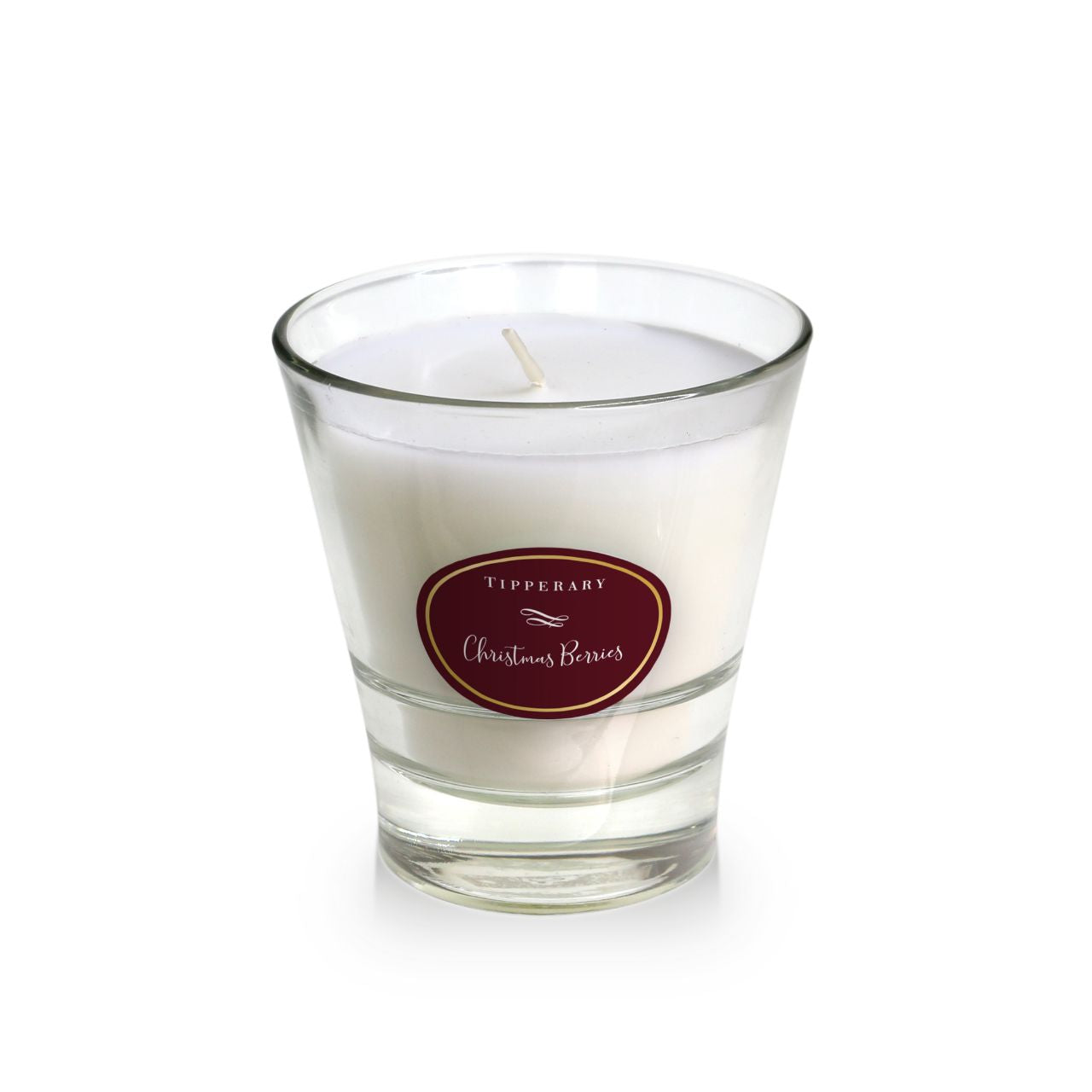 Christmas Berries Poinsettia Tumbler Candle by Tipperary  Christmas Berries express the irresistible freshness of a bouquet of roses, sweetened with blackcurrant leaves. A beautiful Christmas scent for the festive season.