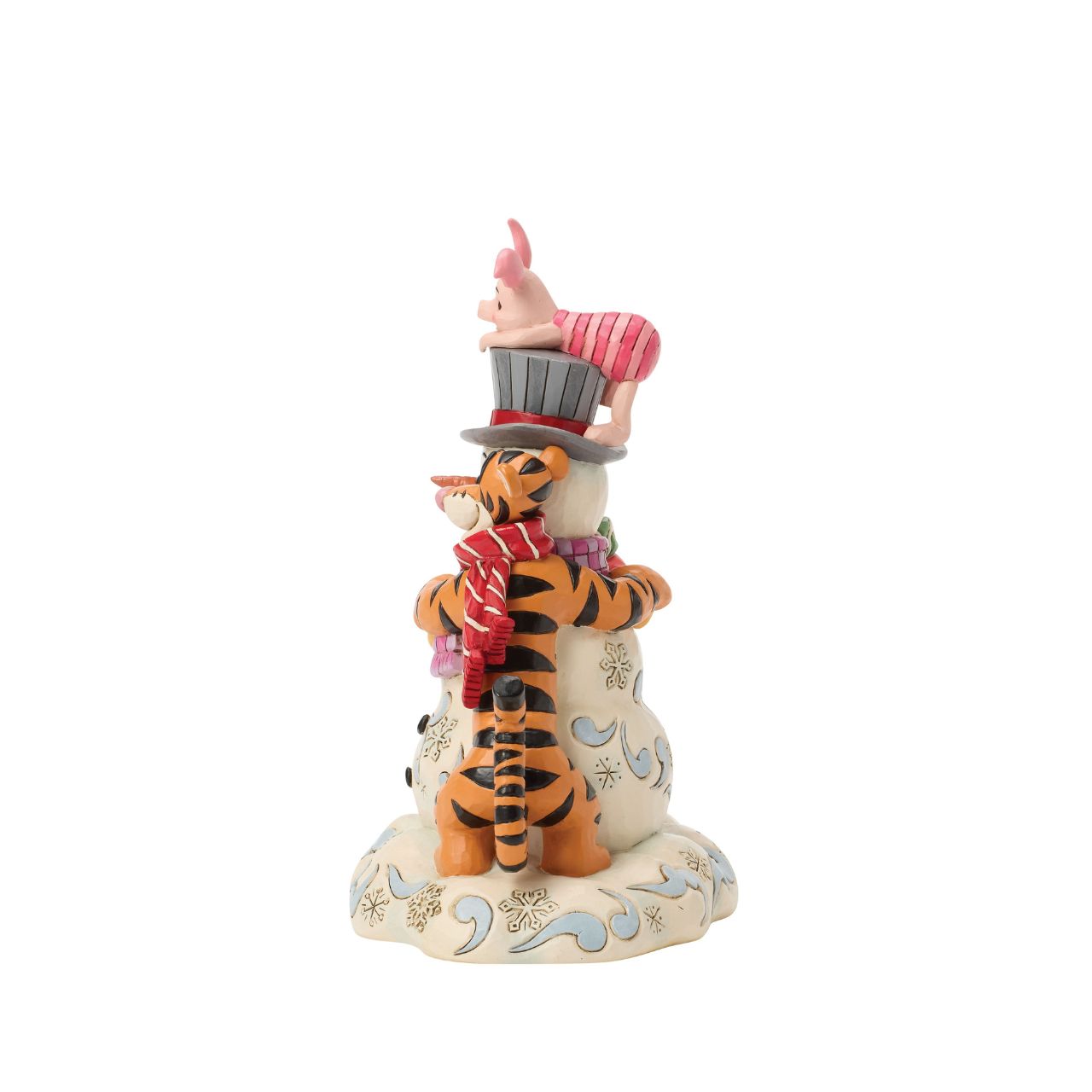 Pooh, Tiger, and Piglet build winter magic together in this cosy Jim Shore design. With bright scarves, rosy cheeks, and a jolly snowman, the scene captures the charm of snowy adventures and the sweetness of friendship with Jim Shore's iconic style.
