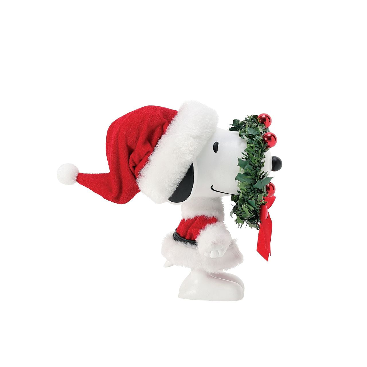 Snoopy is all decked out and ready to decorate for the holidays. He sports a fur trimmed Santa hat and coat along with an eye-catching wreath. Made with special Clothtique - a fabric that is stiffened to keep its shape and preserve it's look - this piece is part of the official Possible Dreams line.