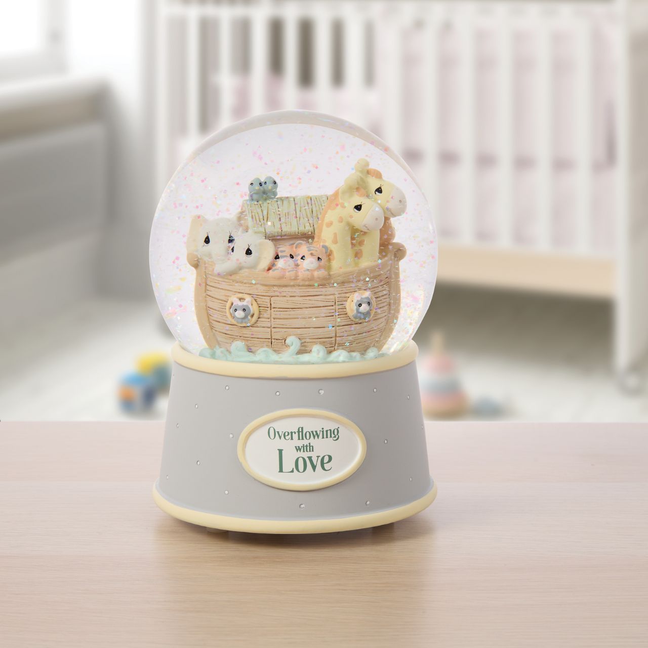 Crafted by Precious Moments, this charming Noah's Ark waterball captures timeless appeal with intricate detailing and heartfelt design. Perfect for baby showers, christenings, and meaningful gifts, it brings warmth to any shelf or nursery.