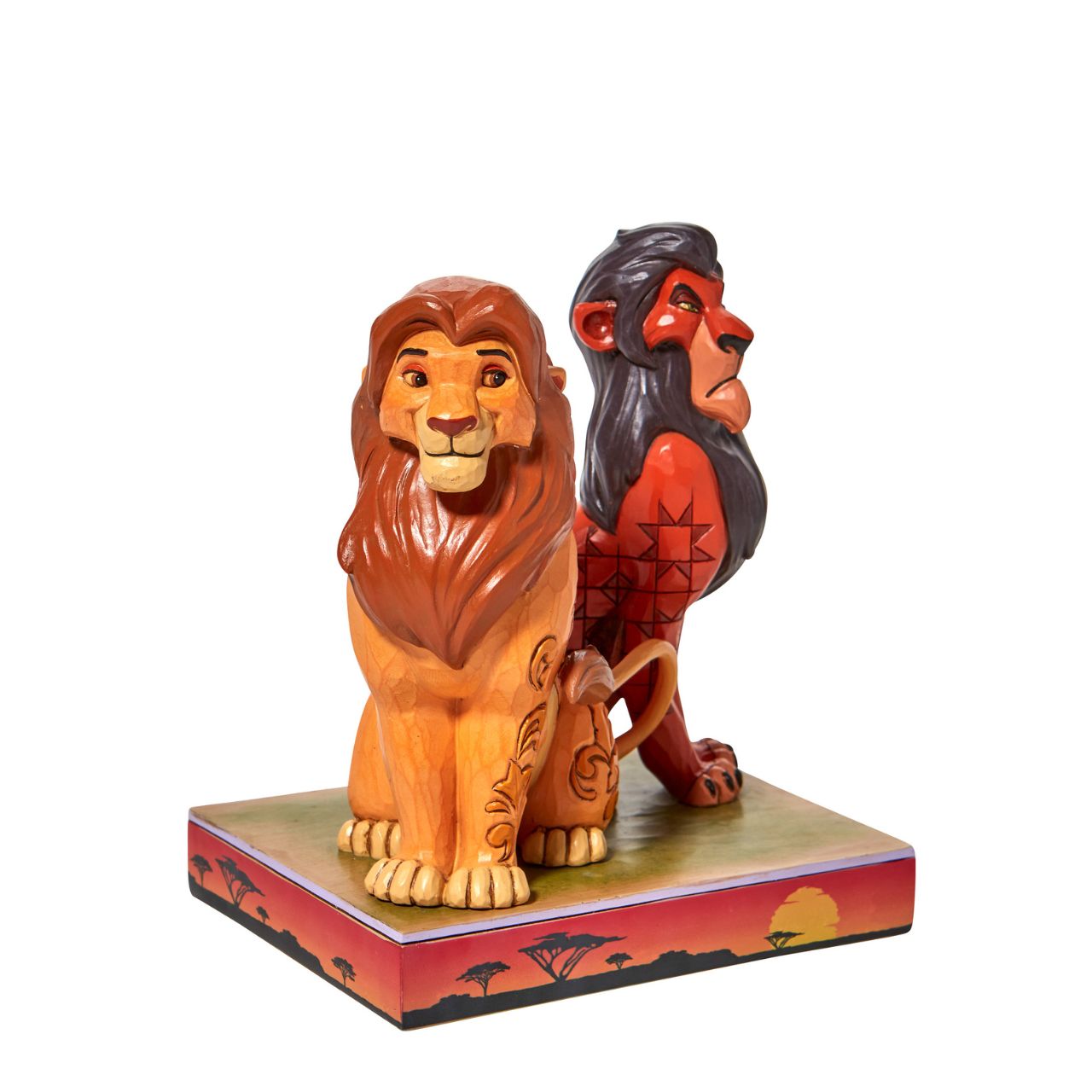 "Proud and Petulant" This Jim Shore piece ventures into the African savanna to share a scene of good and evil. Striking a winning pose, Simba, the rightful king, smiles next to his murderous uncle, Scar. The pair of lions make a daring duo of strength and pride.