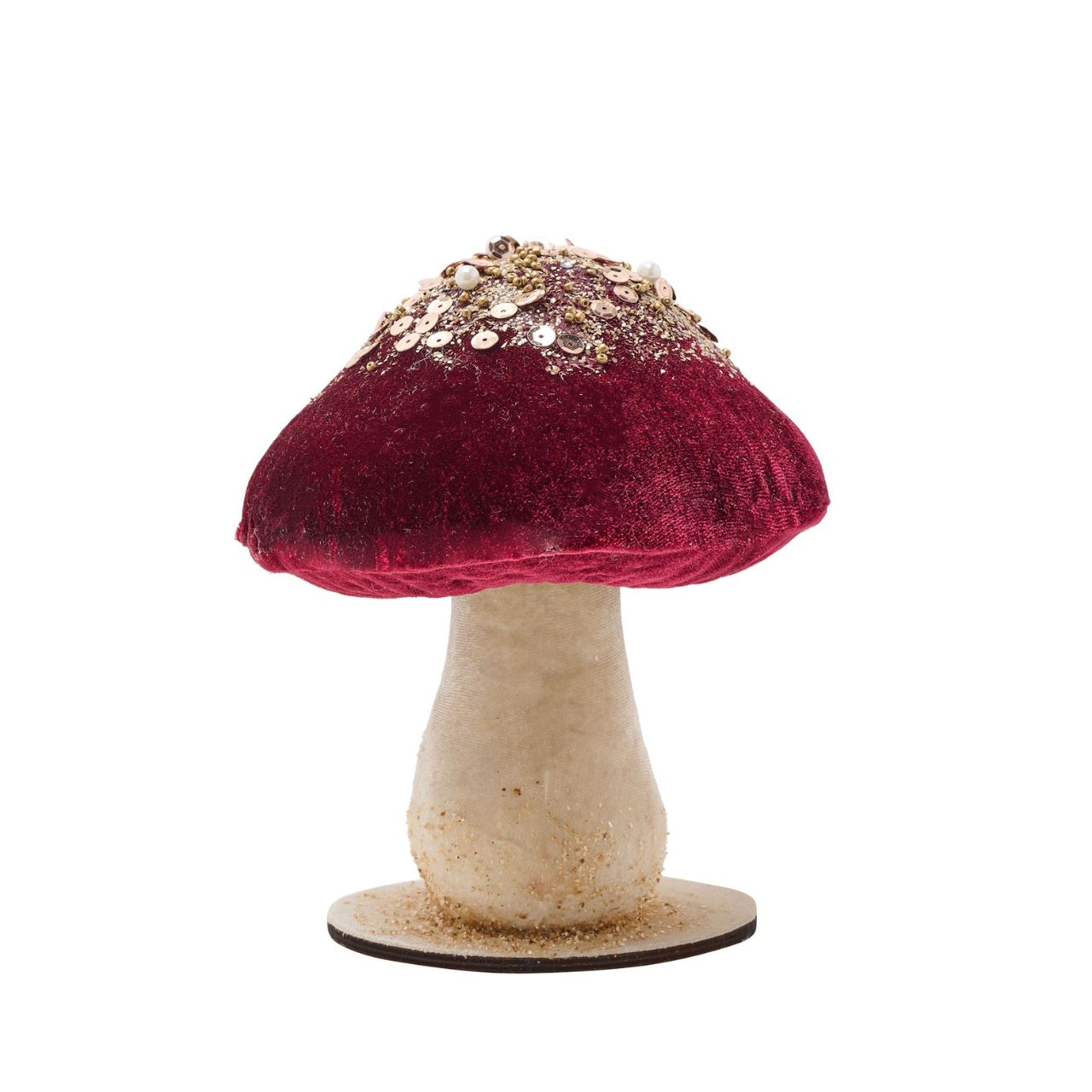 A pretty as a picture Red Velvet Mushroom ornament that brings a touch of whimsy to home décor over the festive period. Perched atop a smooth base and accented with sparkling sequins and faux moss for an extra pop of colour.