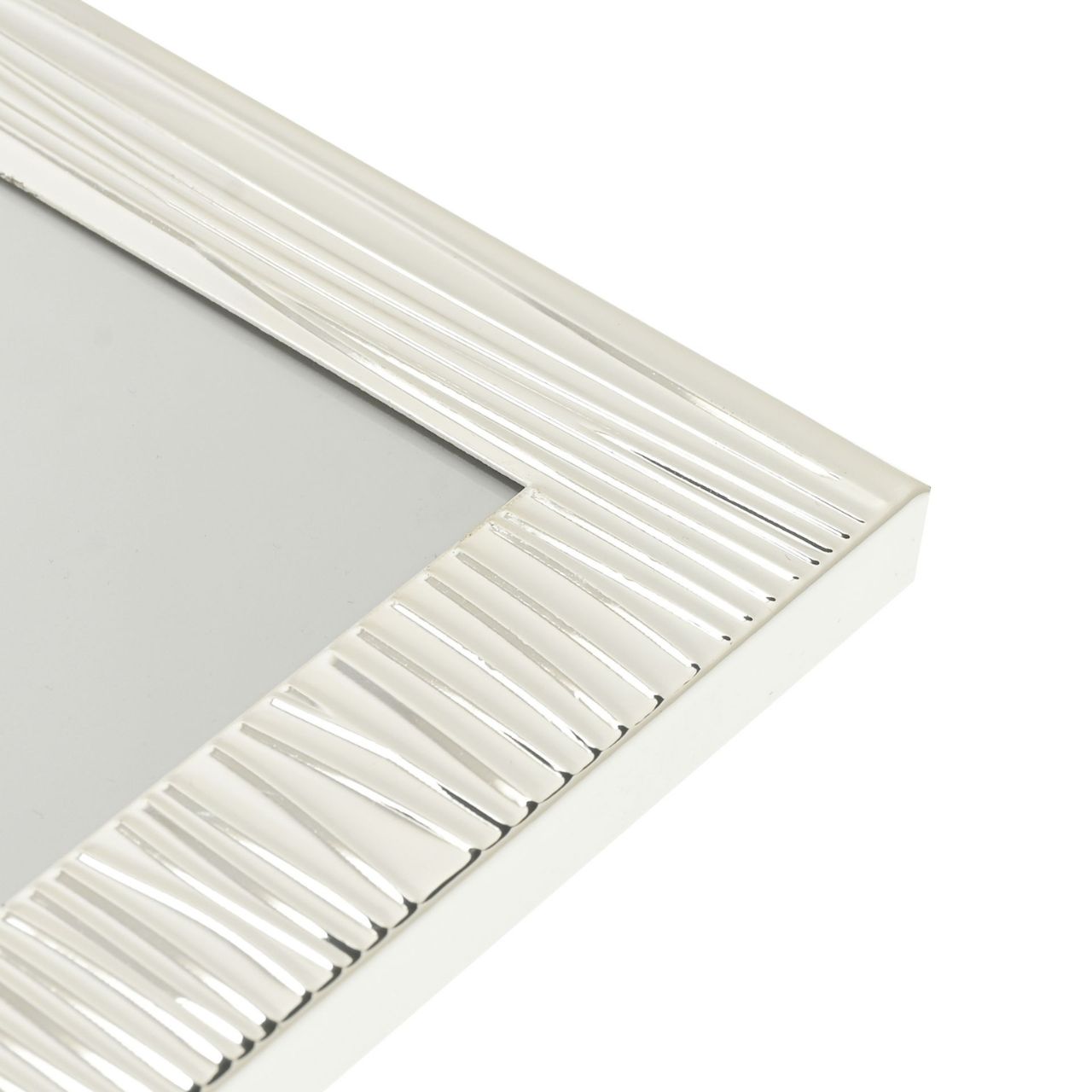 Ripple Texture Silverplated Frame 8" x 10"  A silver plated ripple texture photo frame.  This beautifully decorated frame adds a modern touch to the home and gives treasured photographs the treatment they deserve.