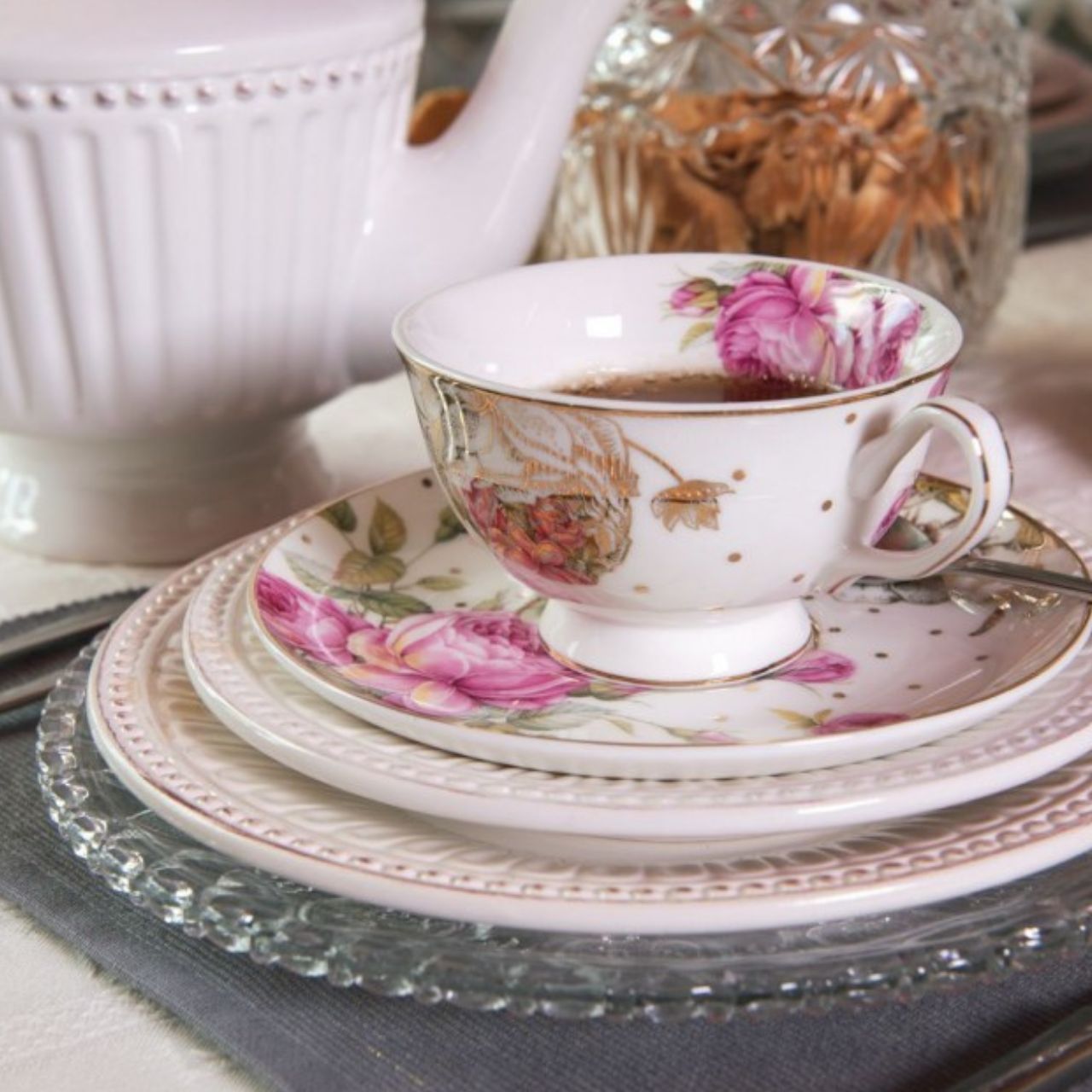 This premium porcelain cup and saucer set features a romantic floral design with pink flowers. Crafted to the highest quality standards, the elegant cup offers a delicate and eye-catching presentation. Enjoy your favourite beverage in style with this romantic cup and saucer set.