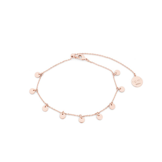 Romi Dublin Disc Chain Bracelet Rose Gold  This easy-to-wear jewellery collection was inspired by daughter Romi who loves to style and accessorise. An outfit isn’t complete until the perfect pieces of jewellery and accessories have been selected to enhance it.