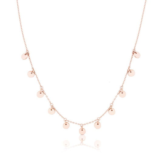 Romi Dublin Mini Disc Chain Necklace Rose Gold  This easy-to-wear jewellery collection was inspired by daughter Romi who loves to style and accessorise. An outfit isn’t complete until the perfect pieces of jewellery and accessories have been selected to enhance it.