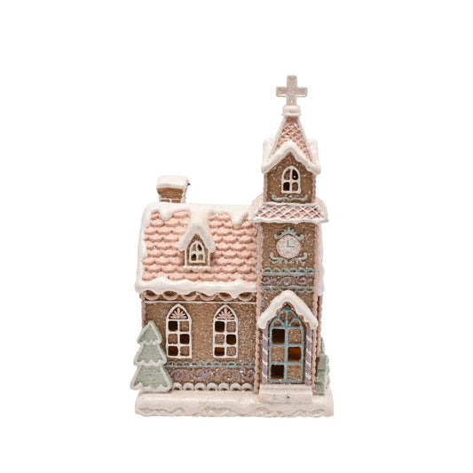 Delight in the festive spirit with the Santa & Friends Light Up Pastel Gingerbread Church - 23cm, a beautiful item for your seasonal range.