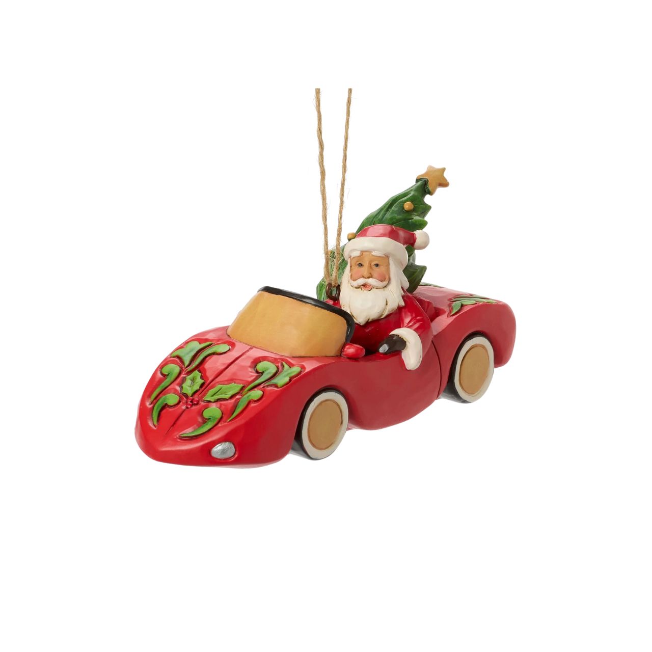 This playful Jim Shore Christmas ornament features Santa cruising in a red sports car adorned with holly, his face beaming with holiday joy. With a Christmas tree and presents packed in the back seat, Santa is ready to spread cheer in sporty style.