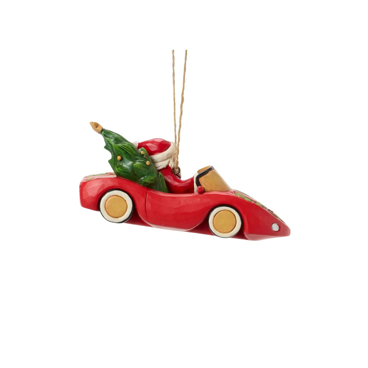 This playful Jim Shore Christmas ornament features Santa cruising in a red sports car adorned with holly, his face beaming with holiday joy. With a Christmas tree and presents packed in the back seat, Santa is ready to spread cheer in sporty style.
