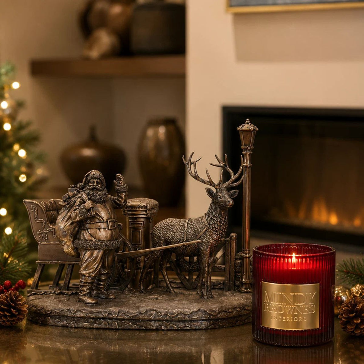 A beautiful bronze coloured Christmas decoration, by Genesis Ireland. Depicting Santa and his sleigh, ready to deliver Christmas cheer to the local village.