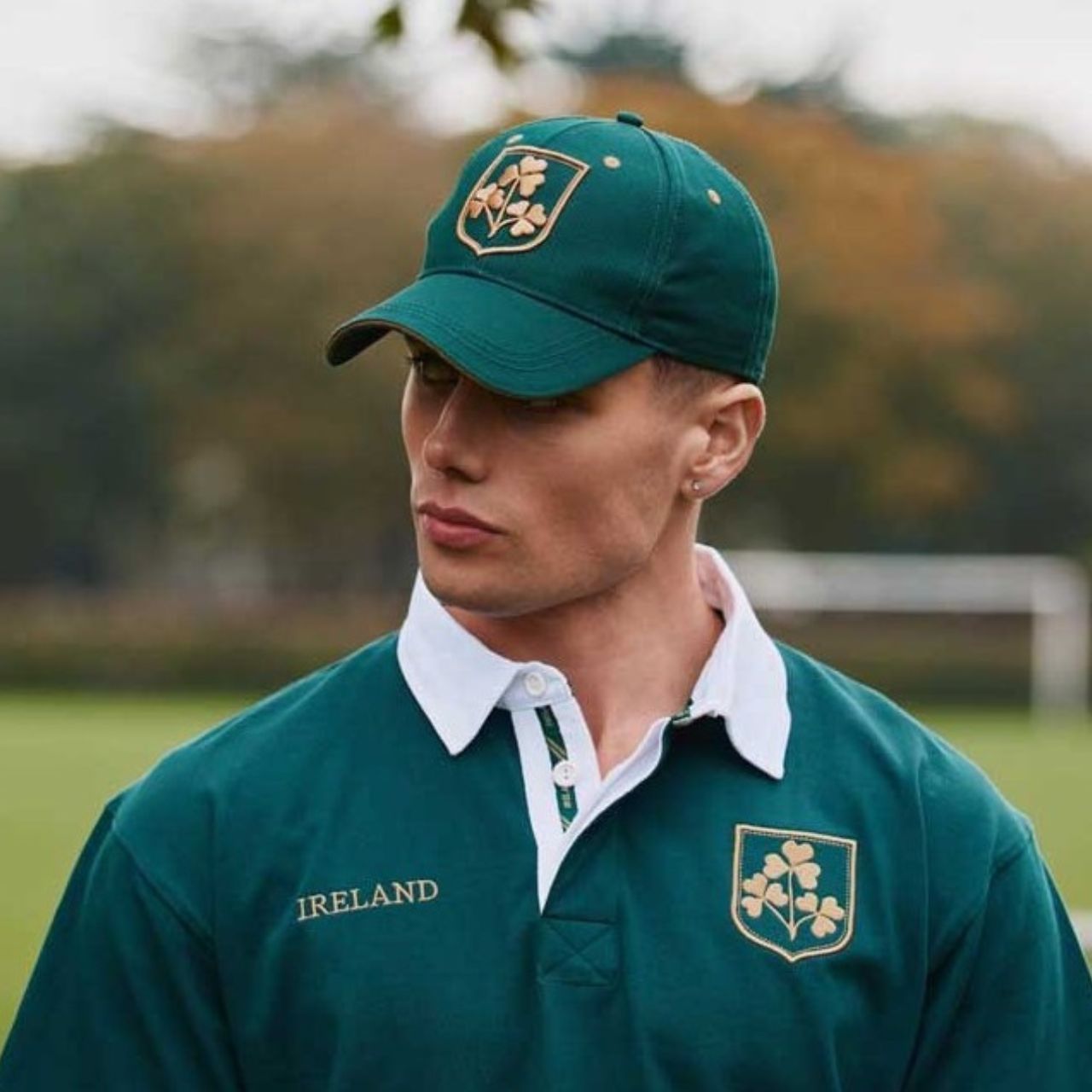 A striking baseball cap finished with Shamrock crest detailing in dark green and gold. Heritage-inspired with a clean structure. Easy to style.
