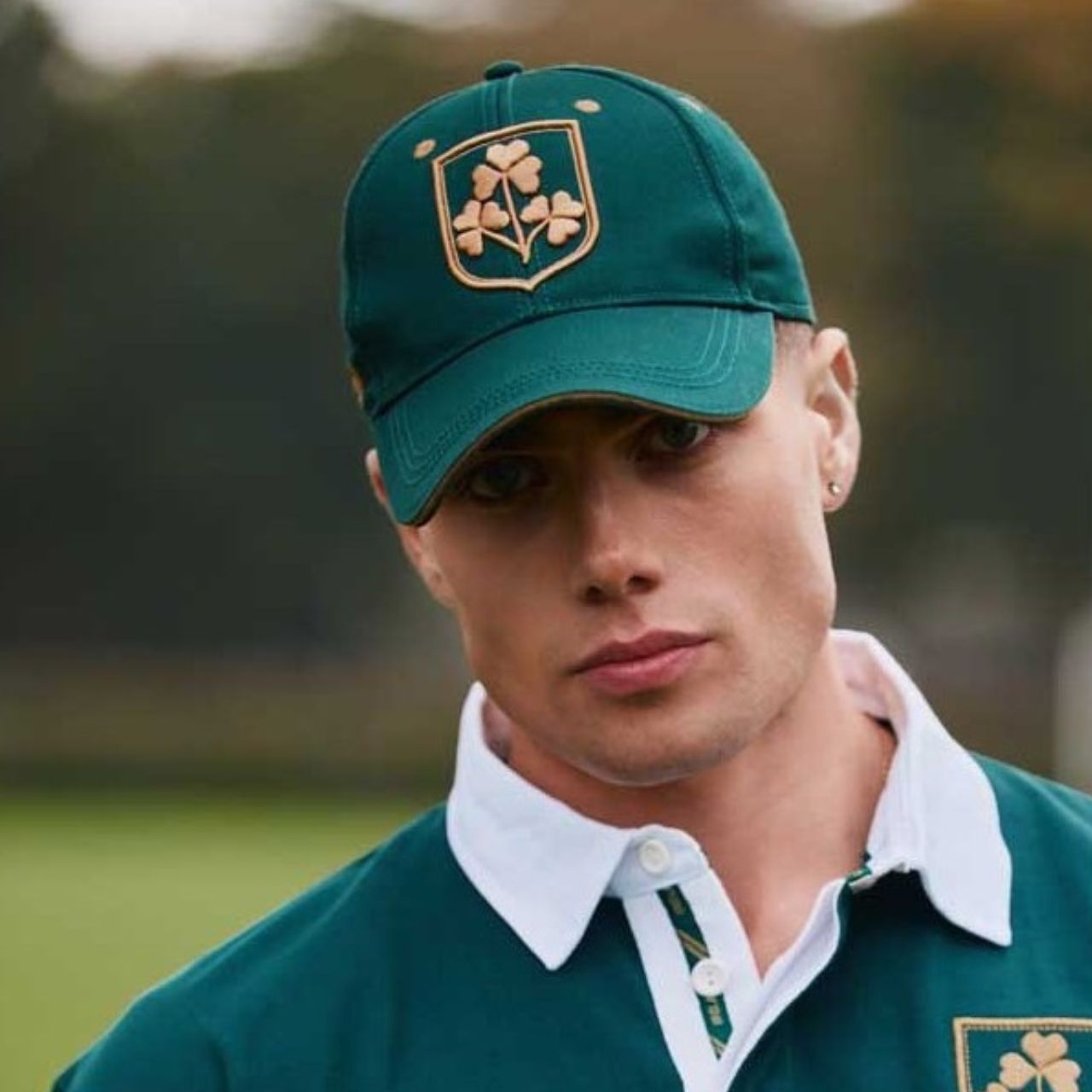 A striking baseball cap finished with Shamrock crest detailing in dark green and gold. Heritage-inspired with a clean structure. Easy to style.