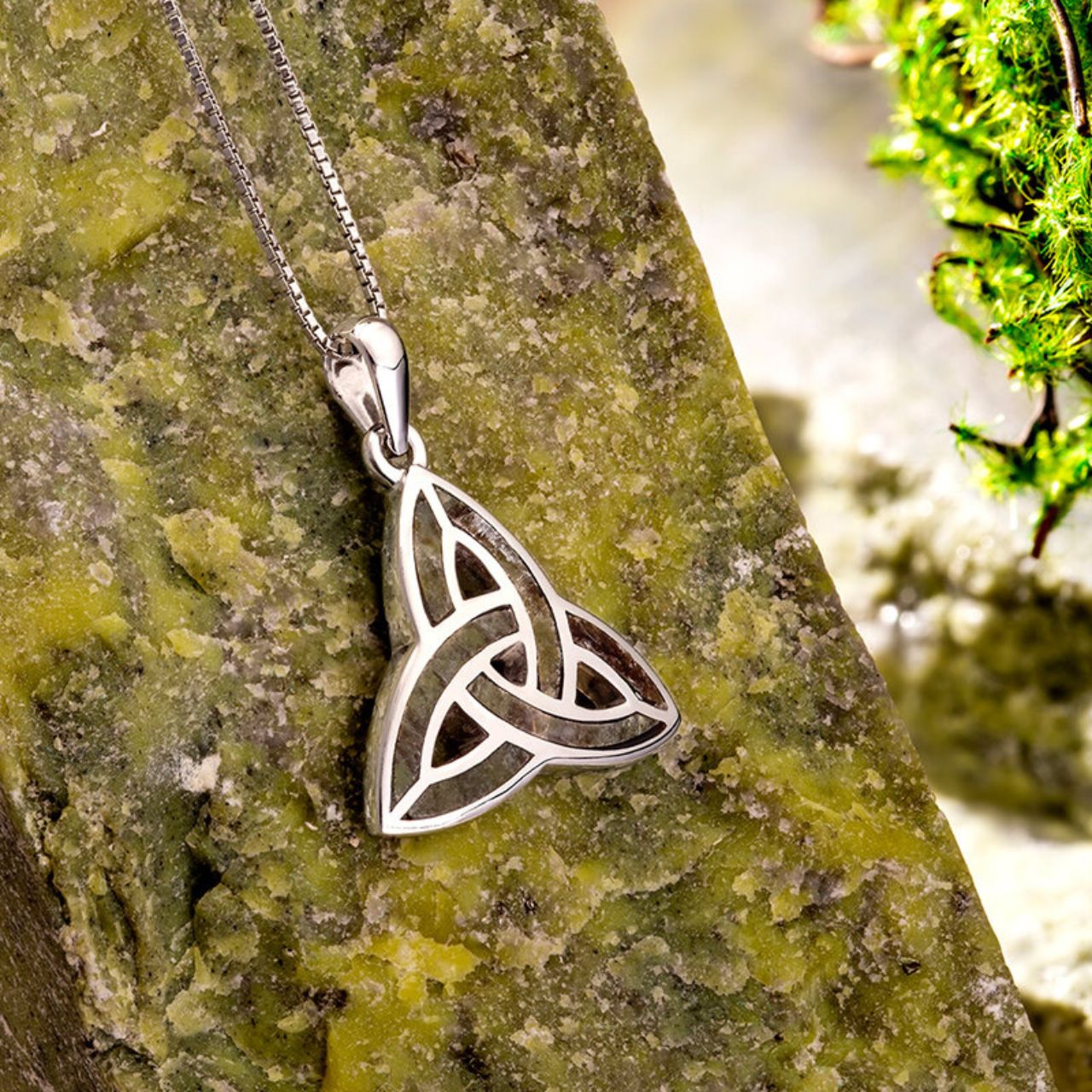 Sterling Silver Connemara Marble Trinity Knot Pendant  The Trinity symbol signifies eternal life and never-ending love, with no beginning and no end. Our expert designers have created this pendant in sterling silver featuring Connemara marble, a unique stone that dates back over 900 million years and is known as “Ireland’s gemstone”.