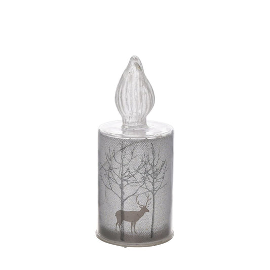 Christmas Silver Forest Scene Small LED Glass Candle Light  A small silver forest scene LED candle-shaped light by THE SEASONAL GIFT CO.  This glistening light will help to create a magical Winter Wonderland at home this festive period.