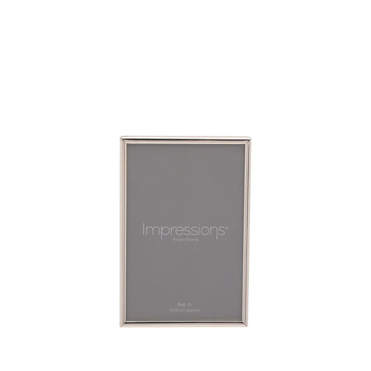 A beautifully simple silver plated photo frame from IMPRESSIONS by Juliana. Featuring a luxury black velveteen standing strut.