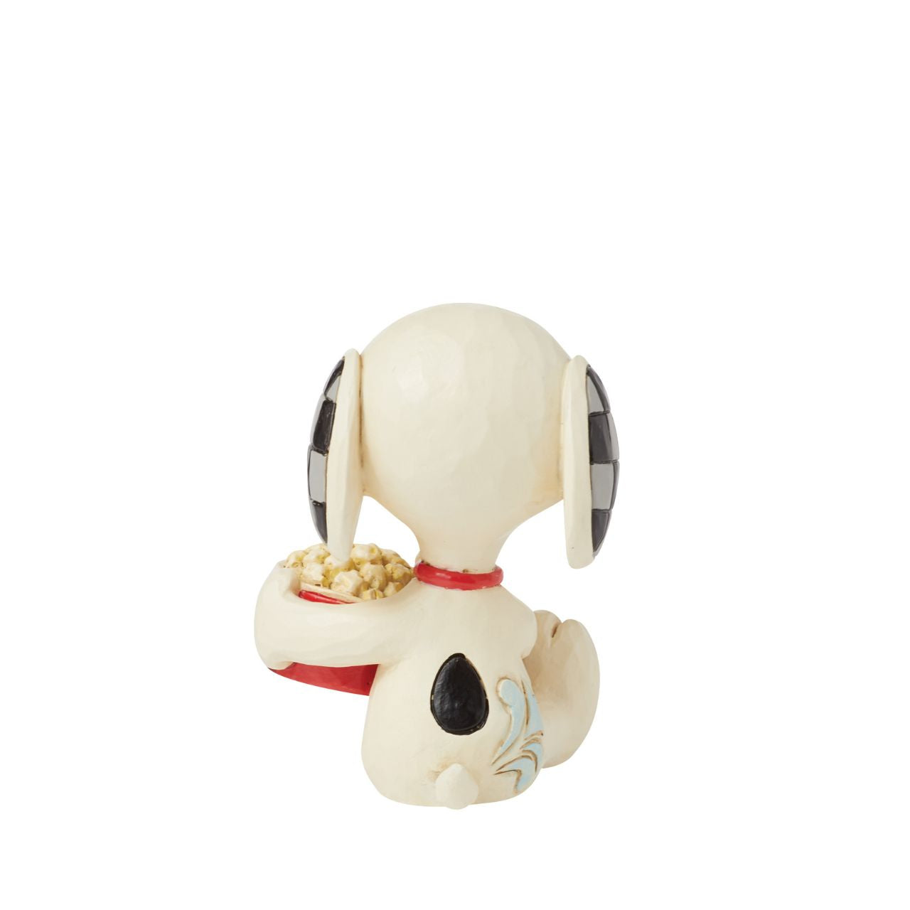 The ever so cheeky Snoopy is having the best time with a large tub of popcorn, ready to watch his favourite film. Mini figurine from the Peanuts collection by Jim Shore. Comes in fully branded packaging.