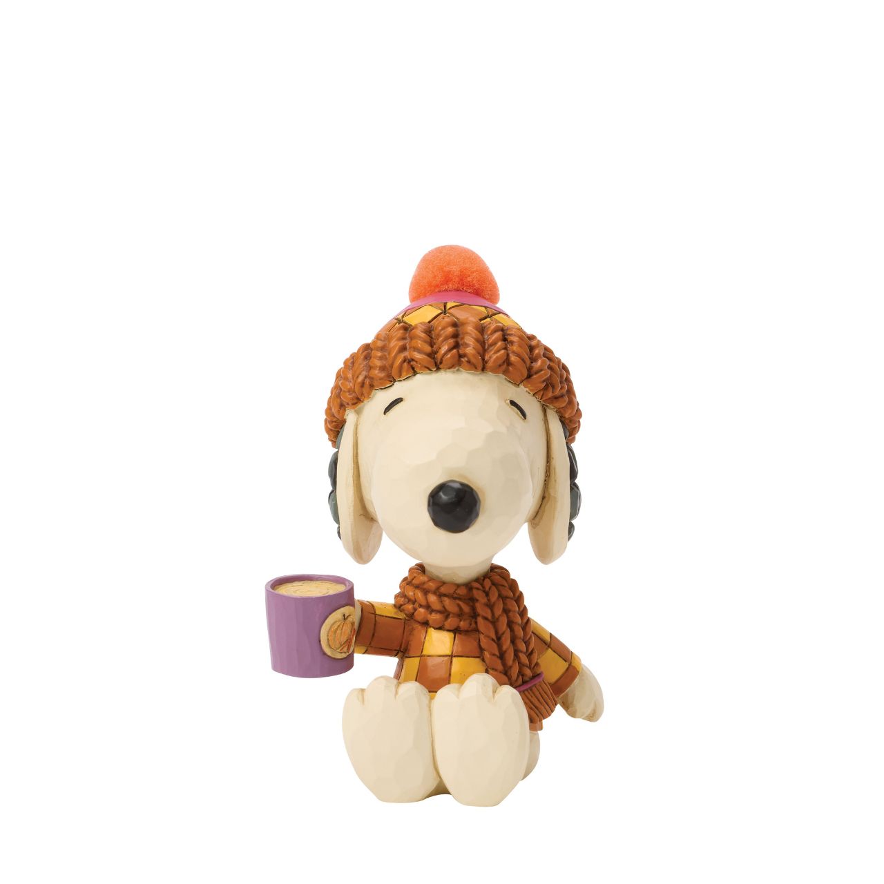 Snoopy bundles up in cosy shades of orange in this charming Jim Shore design. Dressed for fall with a pompom hat and a mug in hand, he brings warmth and whimsy to autumn days with classic folk-art touches.