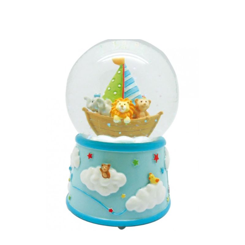 Blue glitter globe with wild animals on a sailboat. In the globe filled with glitter some cute animals are sitting in a blue sailboat. The base is blue and decorated with clouds on which small animals are sitting. The music box rotates to the melody "Brother John". Measurements: Ø8,7x12,5 cm.