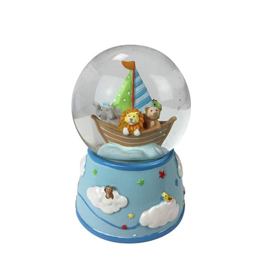 Blue glitter globe with wild animals on a sailboat. In the globe filled with glitter some cute animals are sitting in a blue sailboat. The base is blue and decorated with clouds on which small animals are sitting. The music box rotates to the melody "Brother John". Measurements: Ø8,7x12,5 cm.