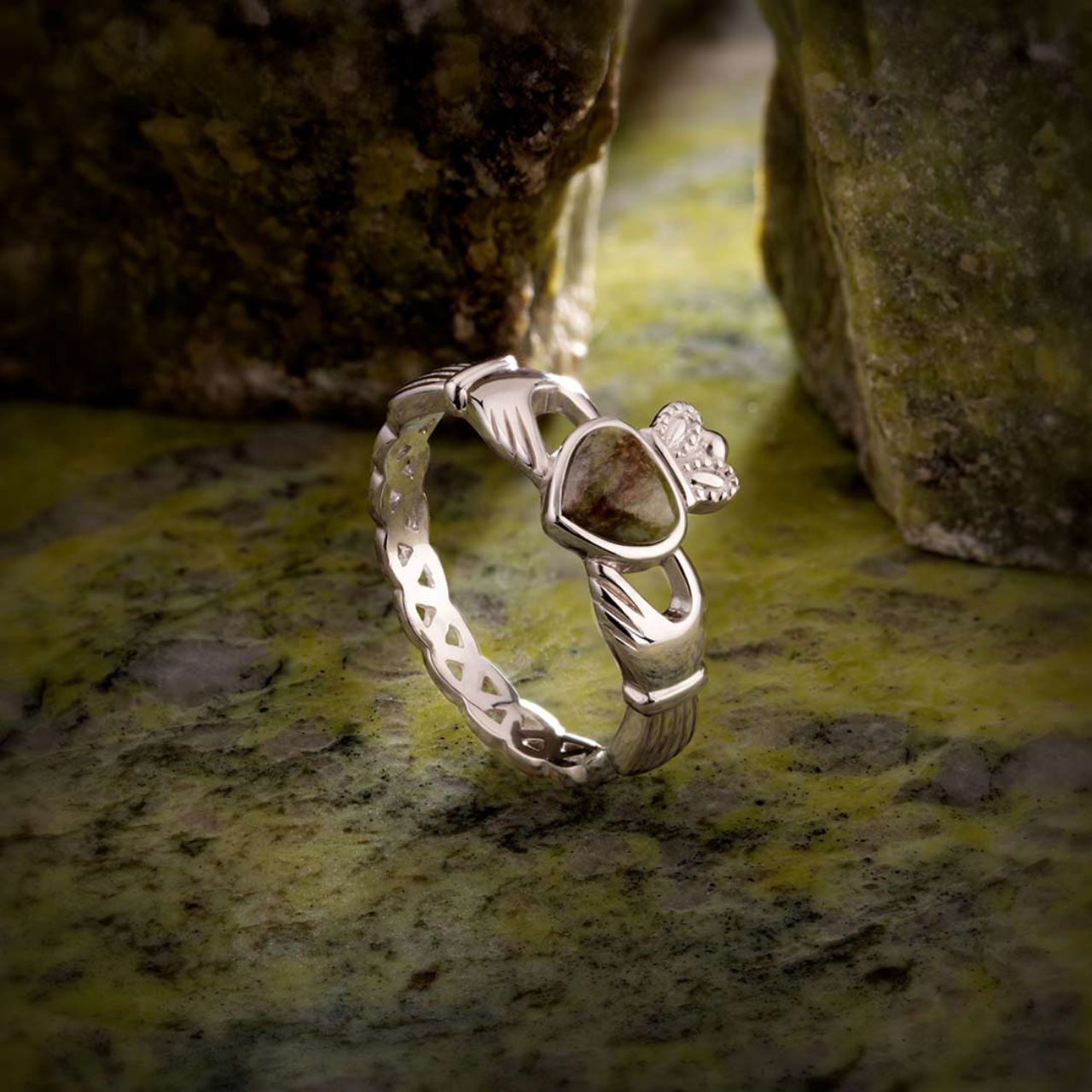 The Claddagh in this ring tells a tale of eternal devotion, with its symbols representing love, loyalty and friendship. Upon the weave band of this sterling silver Claddagh ring sits a heart made of Connemara marble, known as “Ireland’s gemstone”, that dates back over 900 million years.