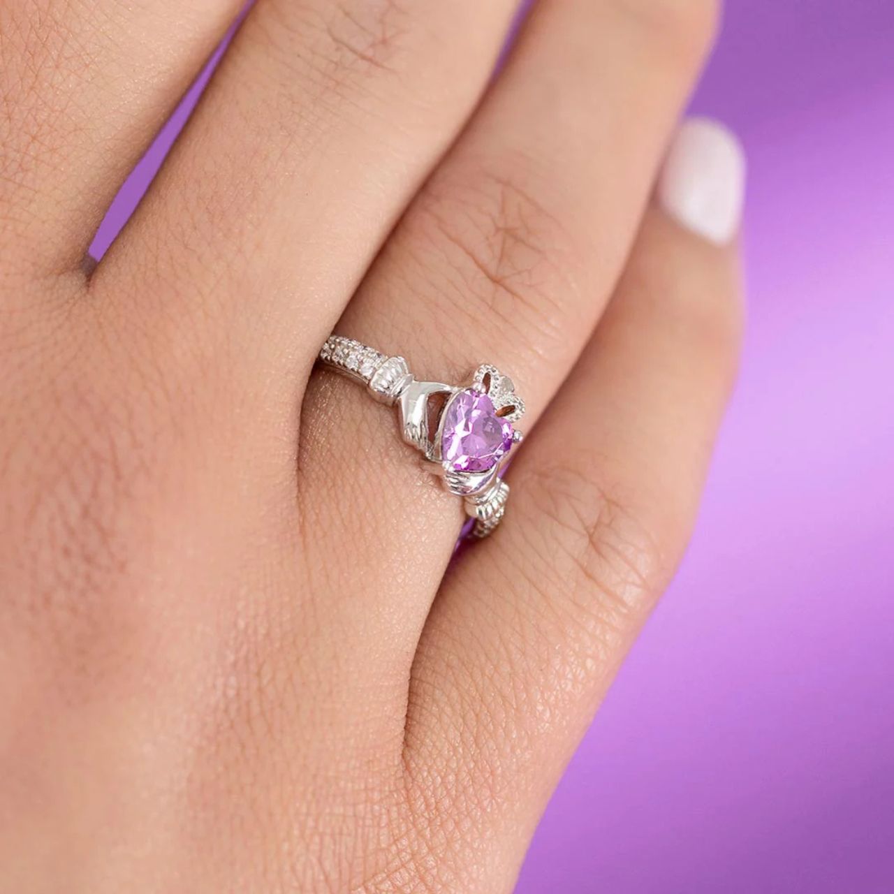 A June birthday is symbolised by a light amethyst stone in this ring. Signifying courage and empowerment, wearing light amethyst is linked with boosted confidence.
