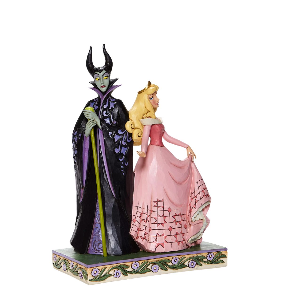 Disney Sorcery and Serenity - Aurora and Maleficent Figurine  Consumed with bitterness and spiteful rage the evil sorceress Maleficent looks down upon Princess Aurora with undisguised contempt. Aurora unfazed by Maleficents baleful glare maintains her grace and poise even as her black clad nemesis plots against her.