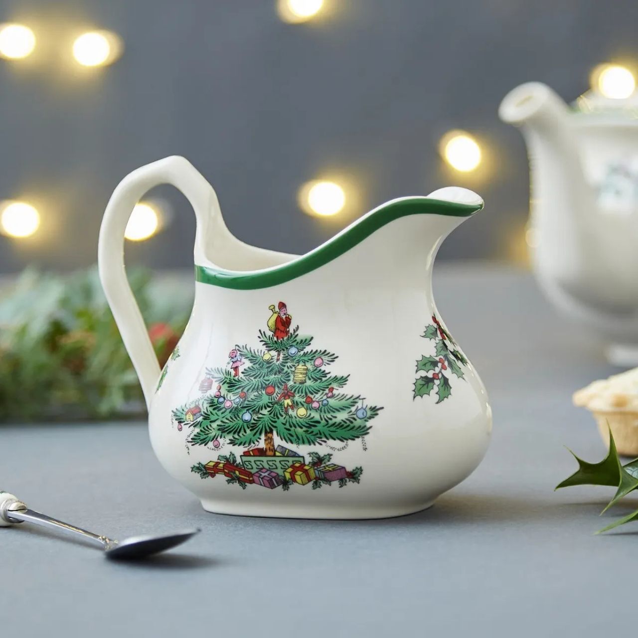 Whether it’s a generous helping of cream on your dessert, or drizzling brandy sauce over pudding, this jug will take pride of place on your table. Featuring the much-loved Christmas Tree design from Spode, this sauce jug has the classic colours of green, gold and red, evoking fond Christmas memories.