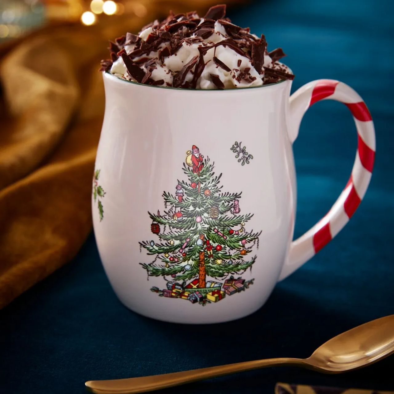 Striped candy cane handles are a gloriously festive addition to these stoneware mugs. Part of the Spode Christmas Tree collection, their seasonal design was created in 1938 and has a charmingly vintage feel.