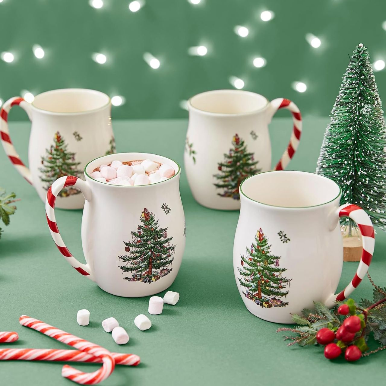 Striped candy cane handles are a gloriously festive addition to these stoneware mugs. Part of the Spode Christmas Tree collection, their seasonal design was created in 1938 and has a charmingly vintage feel.