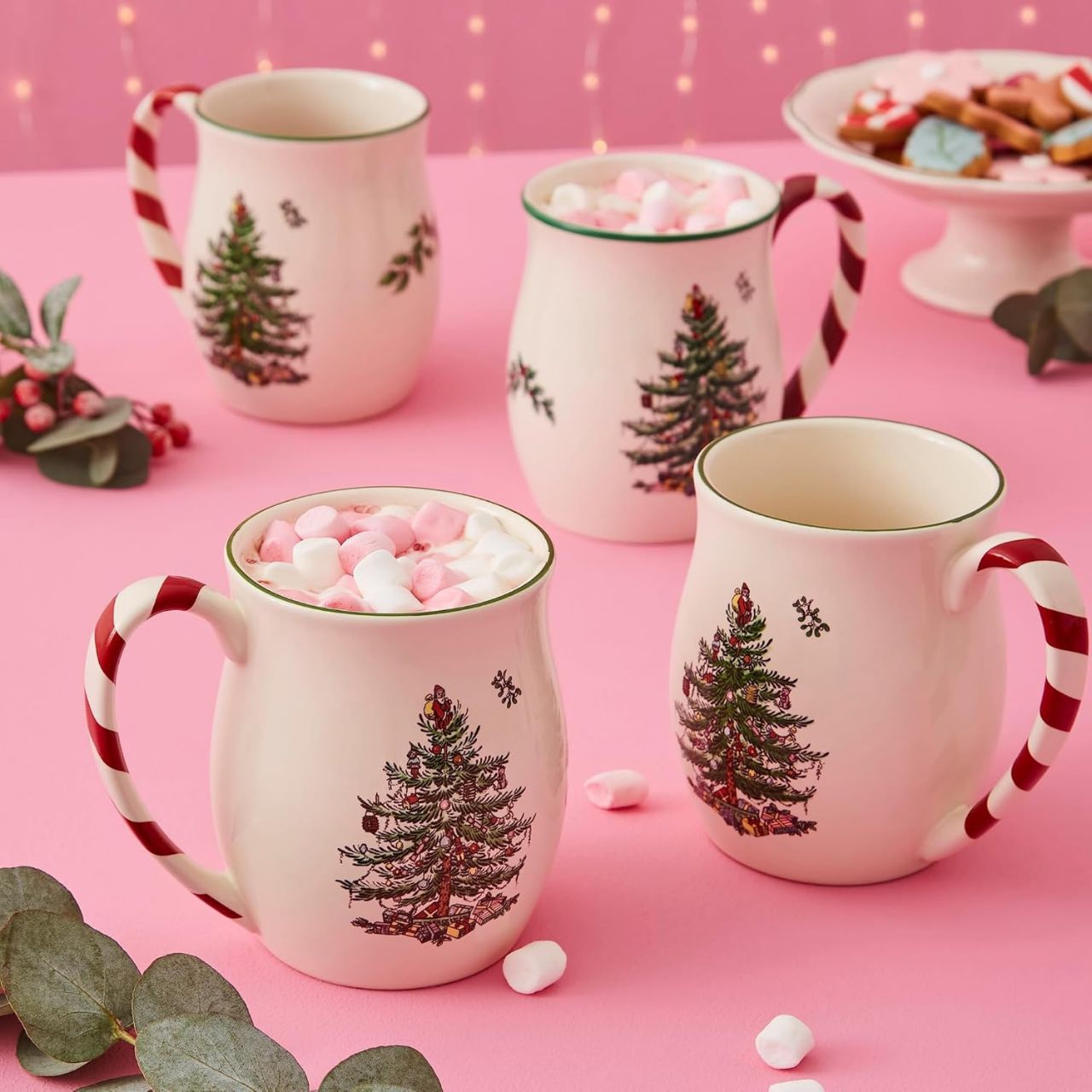 Striped candy cane handles are a gloriously festive addition to these stoneware mugs. Part of the Spode Christmas Tree collection, their seasonal design was created in 1938 and has a charmingly vintage feel.