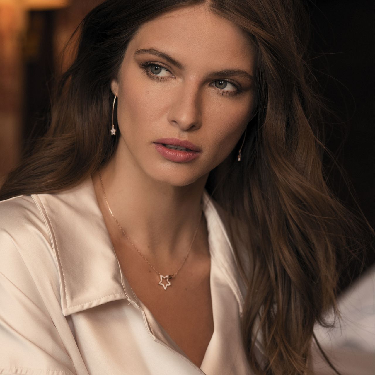 Tipperary Crystal Star Interlocking Pendant Rose Gold  Guaranteed to be a staple piece for years these on-trend interlocking stars comes in rose gold A larger crystal encrusted star is interlocke with a lustrous polished gold star. This pendant suspends from a cable chain which secures safely with a lobster claw clasp.
