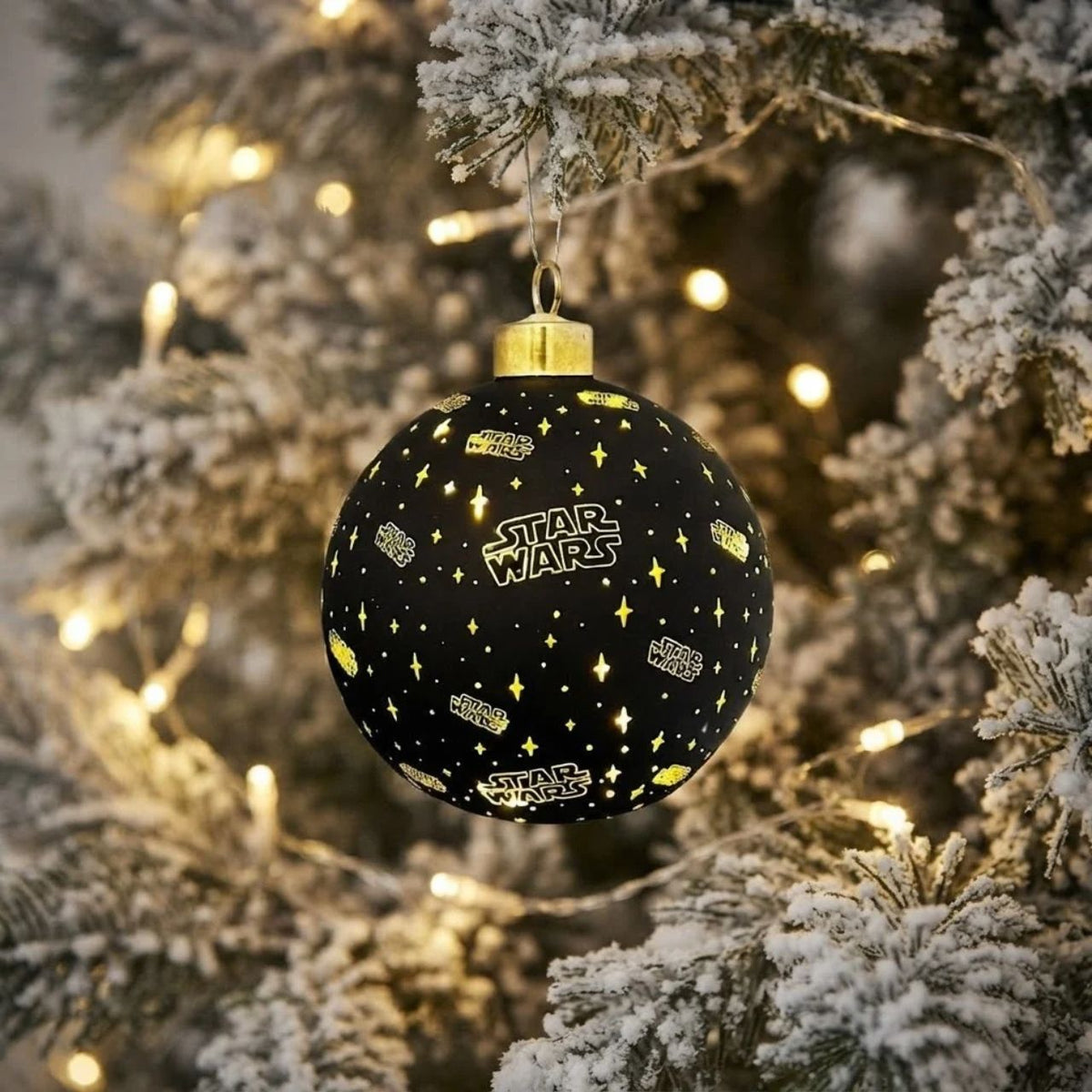 Bring the Force into your festive décor with this Star Wars Small Lighted Christmas Bauble. Standing at 10cm, this charming ornament combines classic holiday spirit with beloved Star Wars characters.