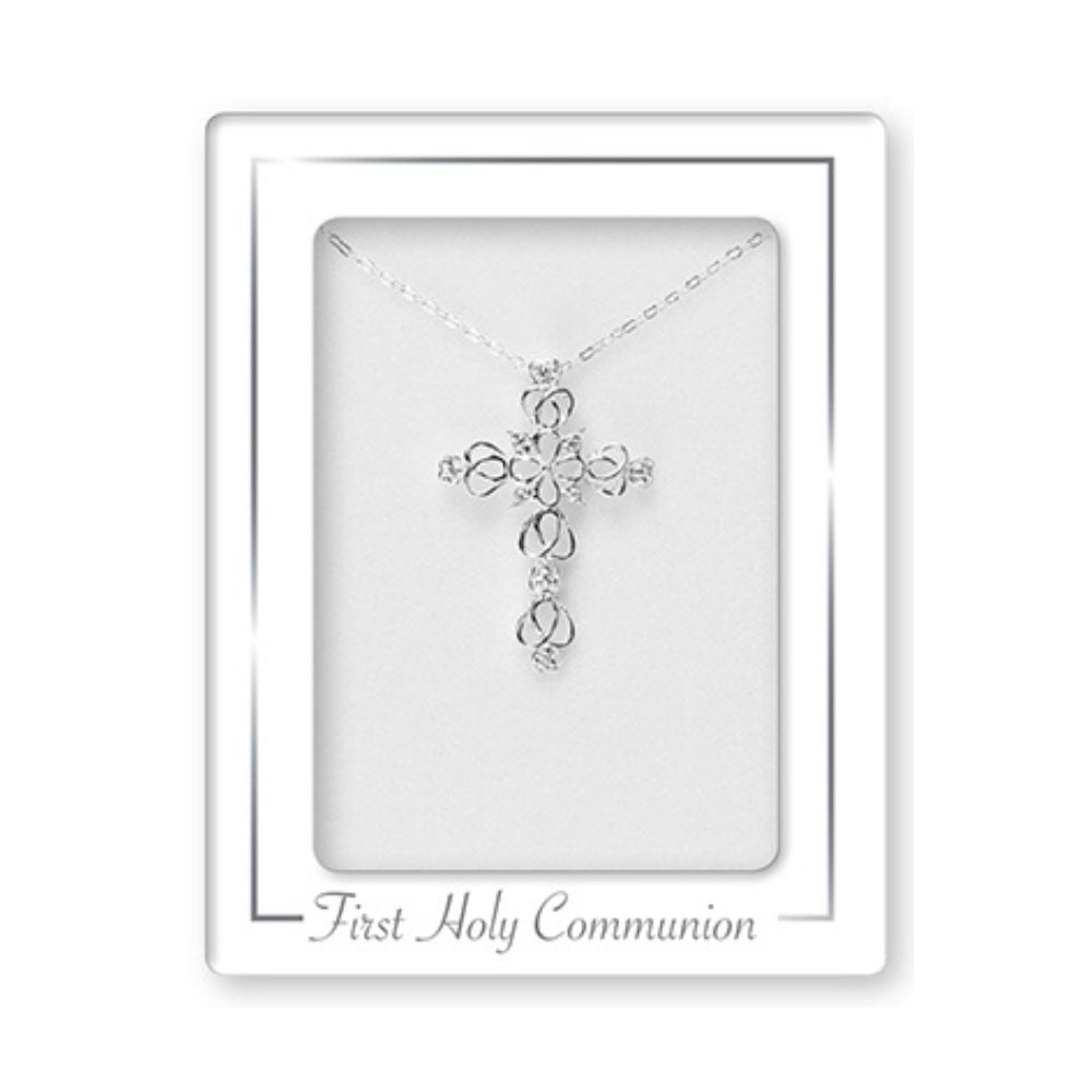 CBC Communion Silver Necklet/Cross  This elegant and timeless Communion Silver Filigree Cross & Chain is expertly crafted to add a touch of grace and spirituality to any outfit. Made with silver and intricate filigree design, it is a perfect symbol of faith and devotion. The lightweight chain adds a delicate finishing touch.