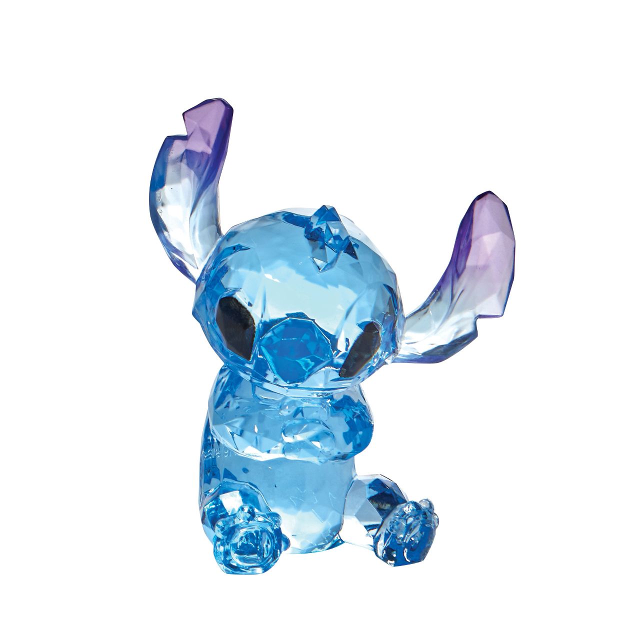 Disney Stitch Facets Figurine  This "gem cut" acrylic sculpture reflects Stitch's sparkling personality and childlike charm. Presented in a branded window gift box. Not a toy or children's product. Intended for adults only.