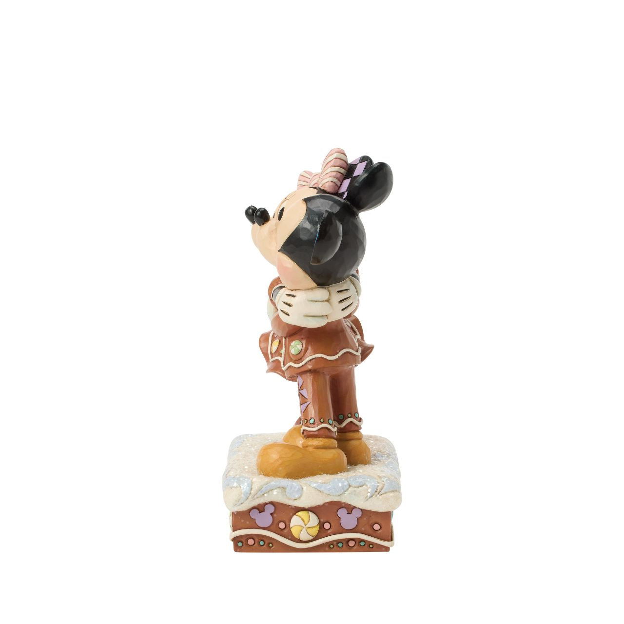 Sweet as sugar, Mickey and Minnie Mouse are decorated like gingerbread cookies in this charming Jim Shore holiday design. With peppermints and rosemaling accents, they look fresh from the oven and full of Christmas cheer as they embrace with love.
